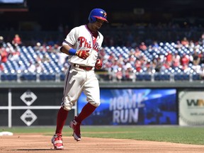 Philadelphia Phillies' Cesar Hernandez rounds the bases after hitting a solo home run during the first inning of a baseball game off Miami Marlins starting pitcher Jose Urena, Sunday, Sept. 16, 2018, in Philadelphia.