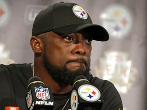 Pittsburgh Steelers head coach Mike Tomlin meets with reporters after an NFL football game against the Kansas City Chiefs in Pittsburgh, Sunday, Sept. 16, 2018. The Chiefs won 42-37.