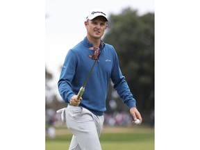 Justin Rose reacts after making a birdie putt on the fourth green during the third round of the BMW Championship golf tournament at Aronimink in Newtown Square, Pa., Saturday, Sept. 8, 2018.