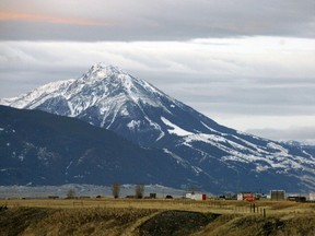 FILE - This Nov. 21, 2016, file photo shows Emigrant Peak towering over the Paradise Valley in Montana north of Yellowstone National Park. U.S. officials are recommending blocking new mining claims on 30,000 acres of public lands around the peak.