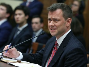 Deputy Assistant FBI Director Peter Strzok speaks during a joint committee hearing of the House Judiciary and Oversight and Government Reform committees in the Rayburn House Office Building on Capitol Hill July 12, 2018 in Washington, DC. While involved in the probe into Hillary ClintonÕs use of a private email server in 2016, Strzok exchanged text messages with FBI attorney Lisa Page that were critical of Trump.