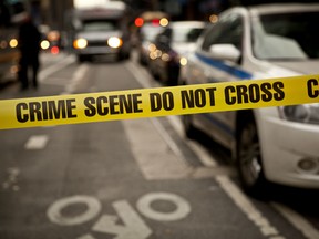 Yellow police tape cordons off a part of a road. Police officers are getting increasingly frustrated at being sent out to resolve social media disputes at the expense of catching thieves and reducing street violence.