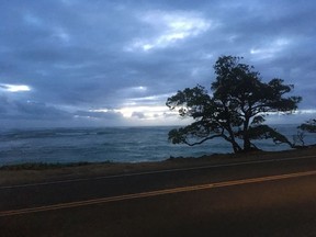 The sun rises on the eastern shore of Oahu, Hawaii, on Wednesday, Sept. 12, 2018. Tropical Storm Olivia dropped heavy rain on Maui and the Big Island on Wednesday, and the impacts from the weakening storm were later expected on Oahu.