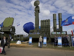 In this file photo taken on Tuesday, Aug. 27, 2013, the Russian air defence system missile system Antey 2500, or S-300 VM, is seen on display at the opening of the MAKS Air Show in Zhukovsky outside Moscow, Russia.
