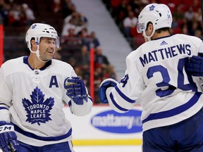 Patrick Marleau congratulates Toronto Maple Leafs teammate Auston Matthews on his goal in the second period during their NHL preseason game against Senators at Canadian Tire Centre in Ottawa on Wednesday night.