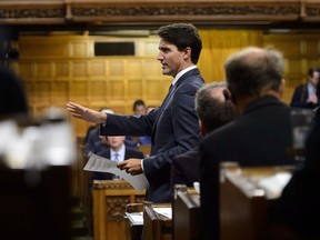 Prime Minister Justin Trudeau stands during question period in the House of Commons on Parliament Hill in Ottawa on Wednesday, Sept. 26, 2018.