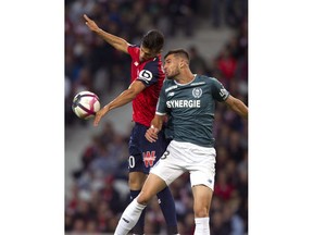Lille's Rui Fonte, left, and Nantes' Matt Miazga vie for the ball during the French League One soccer match between Lille and Nantes at the Lille Metropole stadium, in Villeneuve d'Ascq, northern France, Saturday, Sept. 22, 2018.