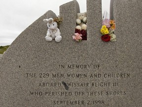 Stuffed animals and flowers mark the Swissair memorial at Whalesback near Peggy's Cove, N.S. on Monday, Sept. 1, 2008.
