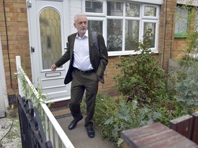 Britain's Labour party leader Jeremy Corbyn leaves his house in London ahead of a meeting of the party's National executive Committee, in London,  Sept. 4, 2018.