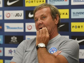 Slovakia's soccer team coach Jan Kozak listens to a question, during a press conference at the training center in Senec, Slovakia, Tuesday, Sept. 4, 2018. Slovakia will play against Denmark in a friendly soccer game on Sept. 5.