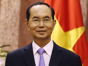 FILE - In this Sept. 13, 2018, file photo, Vietnam's President Tran Dai Quang meets with Myanmar's leader Aung San Suu Kyi at the Presidential Palace during the World Economic Forum on ASEAN in Hanoi, Vietnam. Official media say Vietnamese President Tran Dai Quang has died at age 61 due to illness on Friday, Sept. 21, 2018.