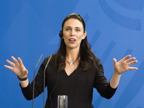 FILE - In this April 17, 2018, file photo, New Zealand Prime Minister Jacinda Ardern speaks to the media in Berlin. Prime Minister Ardern is visiting New York this week for the U.N. General Assembly and has announced a number of high-profile media interviews she'll be doing. But while Ardern is admired abroad by many people who see her as a counterpoint to U.S. President Donald Trump, Ardern is facing political hurdles at home. Last week she fired a lawmaker from her ministerial role. Ardern must get support not only from her own party but also two smaller political parties to govern.