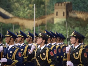 Chinese People's Liberation Army honor guard are seen during the welcoming ceremony for Ghana's President Nana Akufo-Addo, at the Great Hall of the People Saturday, Sept. 1, 2018.