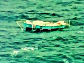 This photo provided by Indian Navy shows the yacht Thuriya of Indian Abhilash Tomy in the Indian Ocean Monday, Sept. 24, 2018.