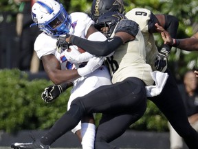 Tennessee State quarterback Demry Croft is sacked by Vanderbilt defensive back Allan George (28) in the first half of an NCAA college football game Saturday, Sept. 29, 2018, in Nashville, Tenn.