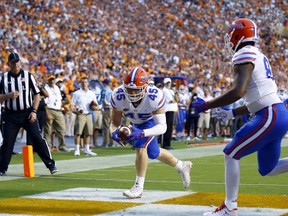 Florida's R.J. Raymond (45) catches a pass for a touchdown in the first half of an NCAA college football game against Tennessee, Saturday, Sept. 22, 2018, in Knoxville, Tenn.