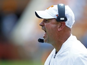 Tennessee head coach Jeremy Pruitt yells at his players in the first half of an NCAA college football game against UTEP, Saturday, Sept. 15, 2018, in Knoxville, Tenn.