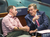 Toronto Mayor John Tory, right, talks with Councillor Josh Matlow during a meeting on Sept. 13, 2018 where city council voted to challenge Ontario’s Bill 31 – which would shrink the size of council – in the courts.