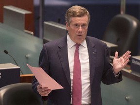 Toronto Mayor John Tory speaks in the Council Chamber at Toronto City Hall , on Thursday September 13, 2018 as council sits to discuss the Ontario Government's introduction of legislation to reduce the size of Toronto City Council.