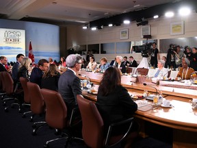Canadian Prime Minister Justin Trudeau speaks as the seat of US President Donald Trump sits empty during the Gender Equality Advisory Council working breakfast on the second day of the G7 Summit on June 9, 2018 in Quebec City, Canada.