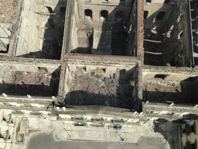 In this Sept. 3, 2018 video grab, the National Museum, seen from above, stands gutted after an overnight fire in Rio de Janeiro, Brazil. A huge fire engulfed Brazil's 200-year-old museum, lighting up the night sky with towering flames as firefighters and museum workers raced to save historical relics from the blaze.