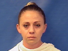 FILE - This file photo provided by the Kaufman County Sheriff's Office shows Amber Renee Guyger. Guyger, a Dallas police officer accused of fatally shooting her neighbor inside his own apartment has been dismissed, the police department announced Monday, Sept. 24, 2018. The Dallas Police Department fired Guyger weeks after she fatally shot 26-year-old Botham Jean inside his own apartment on Sept. 6. Court records show Guyger said she thought she had encountered a burglar inside her own home.(Kaufman County Sheriff's Office via AP, File)