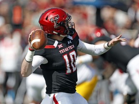 Texas Tech's Alan Bowman (10) throws a pass during the first half of an NCAA college football game against West Virginia, Saturday, Sept. 29, 2018, in Lubbock, Texas.