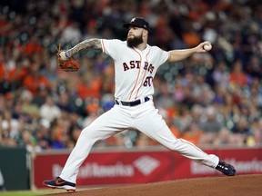 Houston Astros starting pitcher Dallas Keuchel throws during the first inning of a baseball game against the Seattle Mariners Wednesday, Sept. 19, 2018, in Houston.