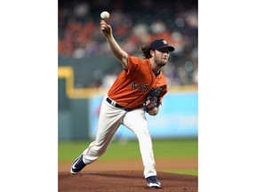 Houston Astros starting pitcher Gerrit Cole throws against the Los Angeles Angels during the first inning of a baseball game Friday, Sept. 21, 2018, in Houston.