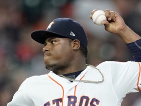 Houston Astros starting pitcher Framber Valdez throws against the Seattle Mariners during the first inning of a baseball game Monday, Sept. 17, 2018, in Houston. 9AP Photo/David J. Phillip)