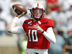 Texas Tech's Alan Bowman (10) passes the ball down field during an NCAA college football game against Houston, Saturday, Sept. 15, 2018, in Lubbock, Texas.