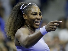 Serena Williams of the U.S. smiles after beating Anastasija Sevastova of Latvia in straight sets during the semifinals of the U.S. Open tennis tournament on Thursday night in New York.