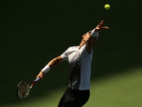 Kevin Anderson, of South Africa, serves to Dominic Thiem, of Austria, during the fourth round of the U.S. Open tennis tournament, Sunday, Sept. 2, 2018, in New York.