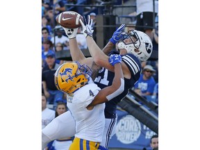 BYU wide receiver Talon Shumway (21) catches a touchdown pass as McNeese State defensive back Colby Burton (4) defends in the first half during an NCAA college football game Saturday, Sept. 22, 2018, in Provo, Utah.