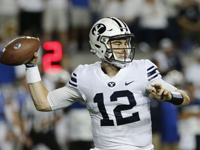 BYU quarterback Tanner Mangum (12) throws a pass against California during the first half during an NCAA college football game Saturday, Sept. 8, 2018, in Provo, Utah.