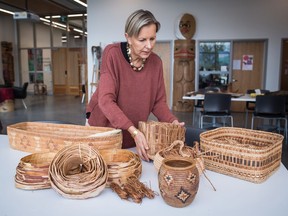 Brenda Crabtree, Director of Aboriginal Programs at Emily Carr University of Art and Design, poses for a photograph at the school in Vancouver, on Friday September 14, 2018. Crabtree, who is a basket making artist, says her late grandmother Matilda Borden liked to pour a cup of tea to display her basket making expertise, proving her cups made from material gathered in British Columbia's forests were watertight.