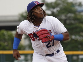 Vladimir Guerrero Jr. chases a foul ball during his time with the Triple-A Buffalo Bisons on July 31.