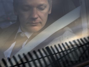In this Jan. 11, 2011 file photo, WikiLeaks founder Julian Assange arrives at Belmarsh Magistrate's court in London for an extradition hearing.