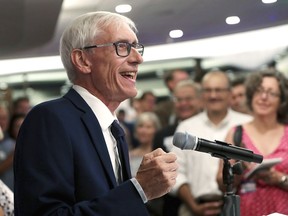 FILE - In this Aug. 14, 2018, file photo, Tony Evers speaks after winning Wisconsin's Democratic gubernatorial primary election during an event in Madison, Wis. Evers faces incumbent Republican Gov. Scott Walker in the November election.