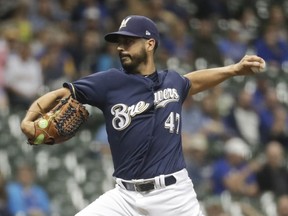 Milwaukee Brewers starting pitcher Gio Gonzalez throws during the first inning of a baseball game against the Cincinnati Reds Wednesday, Sept. 19, 2018, in Milwaukee.