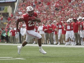 Wisconsin's Jonathan Taylor runs for a touchdown during the first half of an NCAA college football game against New Mexico Saturday, Sept. 8, 2018, in Madison, Wis.