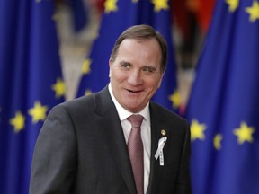 FILE - In this file photo dated Thursday, March 22, 2018, Swedish Prime Minister Stefan Lofven arrives for an EU summit at the Europa building in Brussels. Swedish officials on Sunday Sept. 16, 2018, have officially confirmed Prime Minister Stefan Lofven's ruling Social Democrats getting 28.3 percent winning the most votes in the Sept. 9 general election despite a record low result.