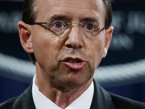 FILE - In this July 13, 2018 file photo, Deputy Attorney General Rod Rosenstein speaks during a news conference at the Department of Justice in Washington. Rosenstein is expecting to be fired, heading to White House Monday morning.