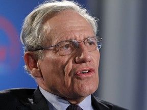 FILE - This June 11, 2012 file photo shows former Washington Post reporter Bob Woodward speaking during an event to commemorate the 40th anniversary of Watergate in Washington. Woodward says top staffers in President Donald Trump's administration "are not telling the truth" when they deny incendiary quotes about Trump attributed to them in his new book.
