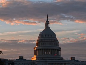 FILE - In this June 20, 2017, file photo, the U.S. Capitol in Washington at sunrise. Keep the government running and confirm Brett Kavanaugh as the next Supreme Court justice. Those are the big-ticket items that Republican leaders in Congress hope to accomplish as lawmakers look to wrap up their work in 2018 and head home to campaign for the November elections.