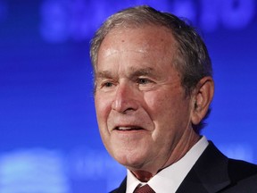 FILE - In this June 23, 2017 file photo, former President George W. Bush speaks during "Stand-To," a summit held by the George W. Bush Institute focused on veteran transition, in Washington. Bush will be in Florida on Friday to fundraise for Gov. Rick Scott's bid to oust Democratic Sen. Bill Nelson in a closely watched and expensive campaign.