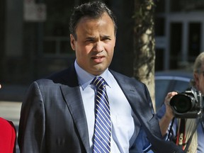 FILE - In this Aug. 25, 2014, file photo, Attorney Bill Burck walks to court in Richmond, Va. Burck is the Republican power player little known outside of Washington who's played a pivotal role in several controversies roiling Washington, including the fight over documents from Supreme Court nominee Brett Kavanaugh.