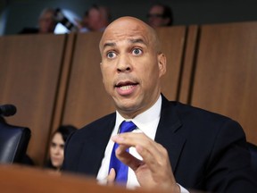 In this Sept. 4, 2018, photo, Senate Judiciary Committee member Sen. Cory Booker, D-N.J. speaks during the committee's Supreme Court nominee Brett Kavanaugh's nominations hearing on Capitol Hill in Washington. Bookerhas released a new batch of "committee confidential" documents about Kavanaugh, even after a conservative judicial group referred his earlier disclosures to the Senate Ethics Committee. The documents released Sept. 12 show Kavanaugh's involvement in President George W. Bush-era judicial nominations, including some that were controversial. Judicial Watch wants the Ethics Committee to investigate as a possible violation of Senate rules.