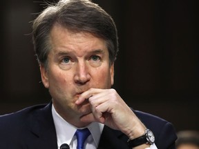 FILE - In this Sept. 5, 2018, file photo, President Donald Trump's Supreme Court nominee, Brett Kavanaugh listens to a question while testifying before the Senate Judiciary Committee on Capitol Hill in Washington.