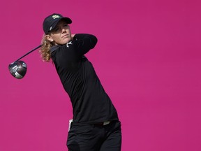 Amy Olson of the U.S. tees off at the start of the fourth round of the Evian Championship women's golf tournament in Evian, eastern France, Sunday, Sept. 16, 2018.
